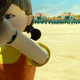 An image from Netflix's Squid Game, in which participants are playing red light green light.